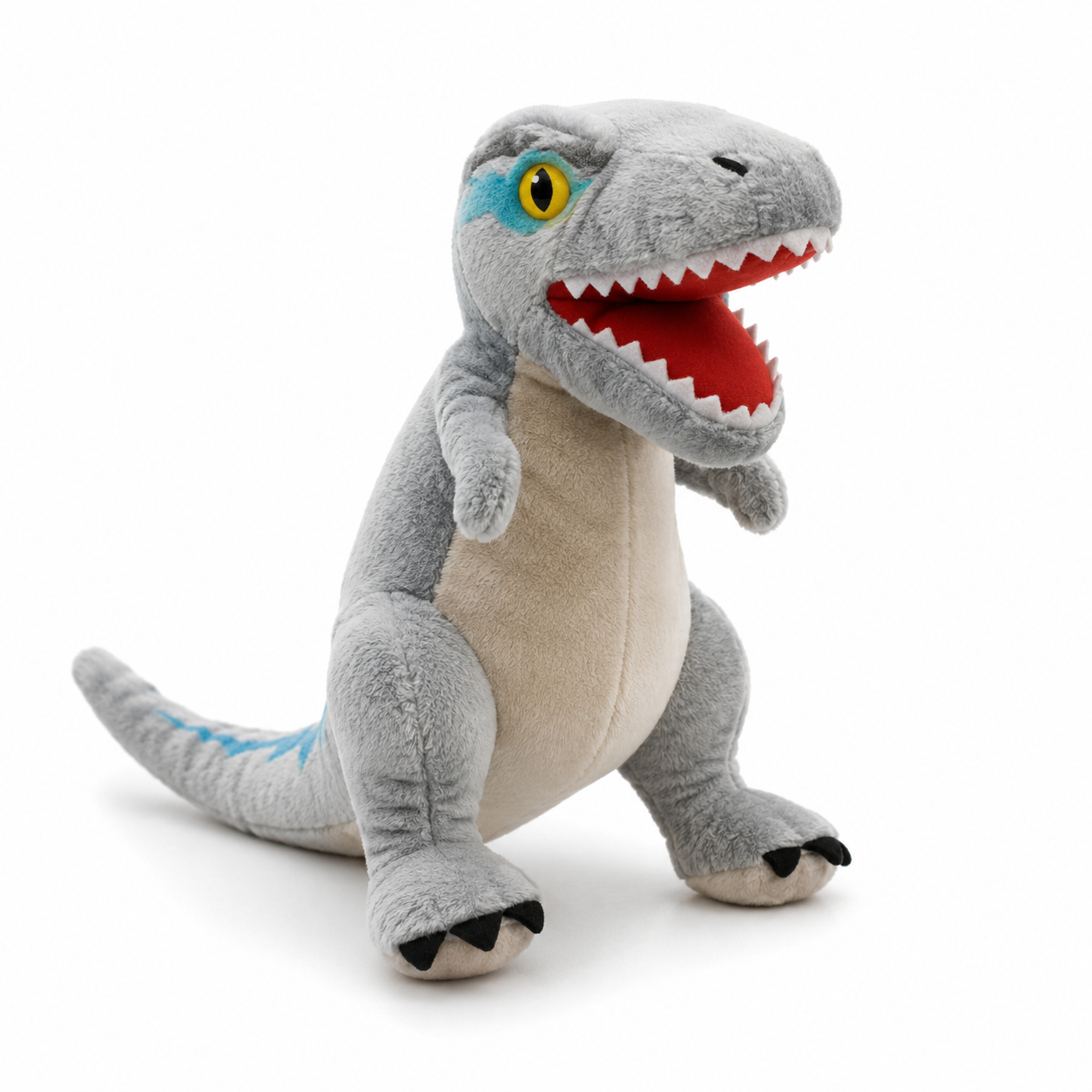 Dinosaure Vélociraptor en peluche rugissant en studio