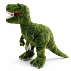 Peluche dinosaure XXL T-Rex verte de 80 cm posée sur un lit d'enfant.