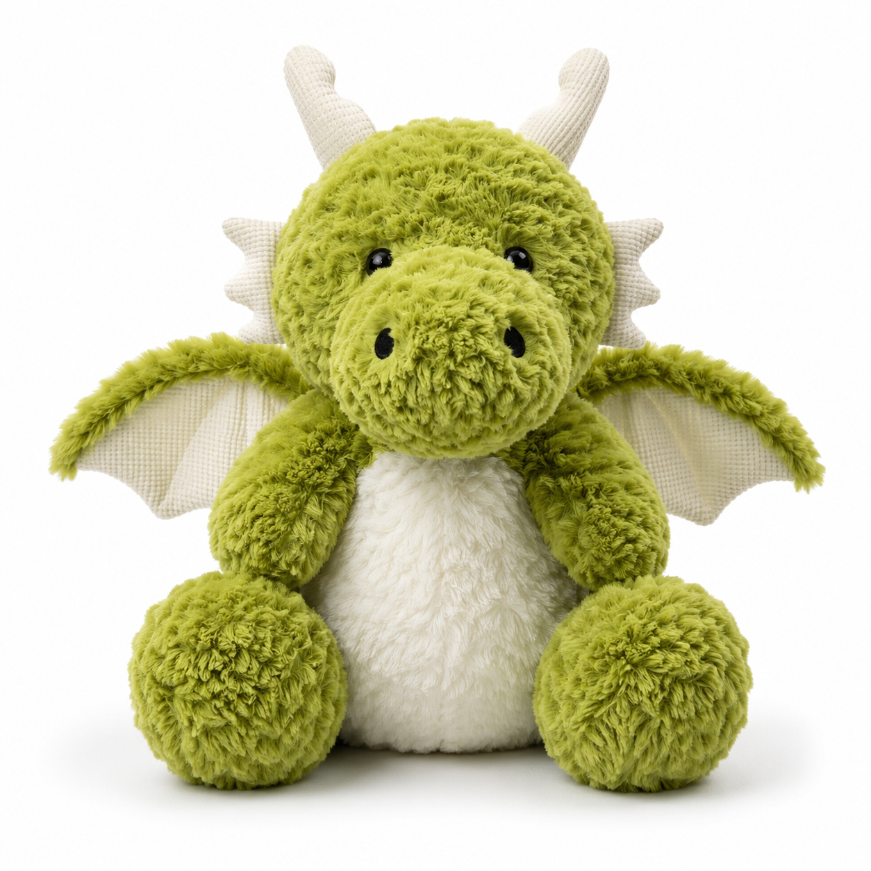 Peluche dinosaure Ptérosaure vert utilisé comme coussin