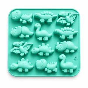 Moule en silicone dinosaure coloré pour réaliser des gâteaux, chocolats et desserts pour enfants